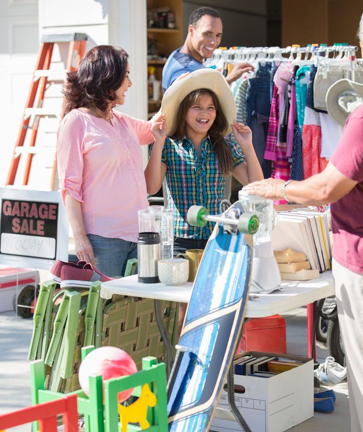 People shopping at garage sale