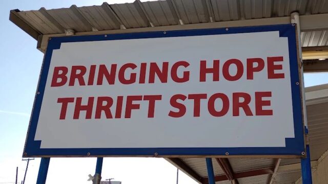 Sign reading "Bringing Hope Thrift Store".