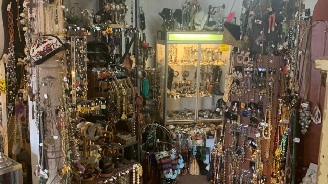 Jewelry shop interior with various accessories displayed.