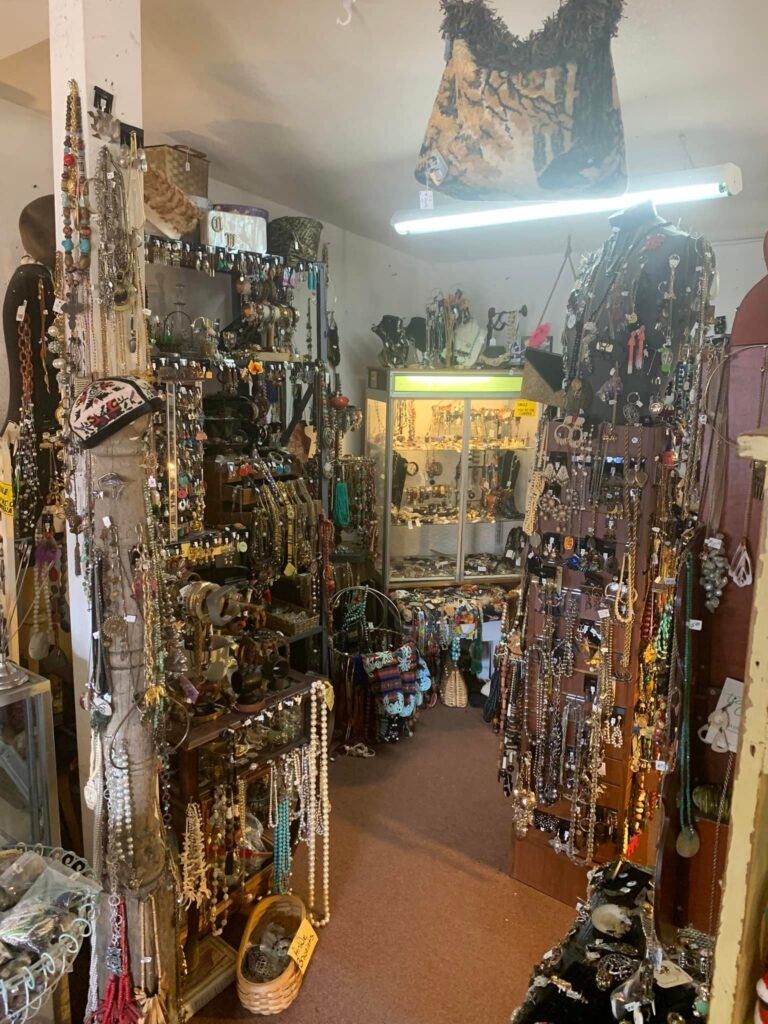 Jewelry shop interior with various accessories displayed.