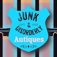 Blue shield logo, "Junk & Disorderly Antiques".